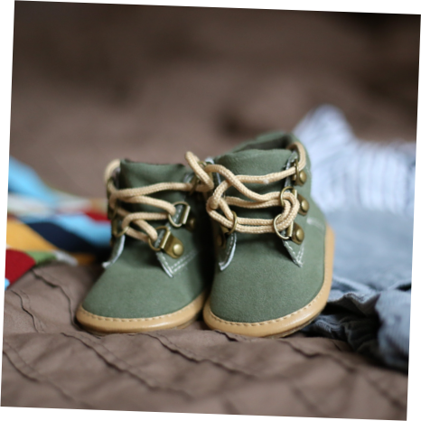 Tiny green baby boots