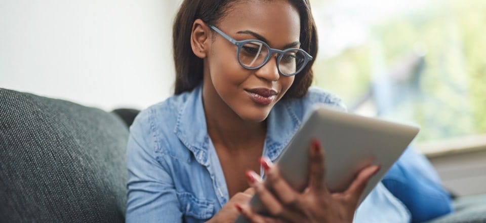 Woman looking at tablet