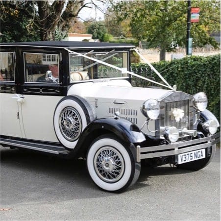 Wedding car with ribbons on