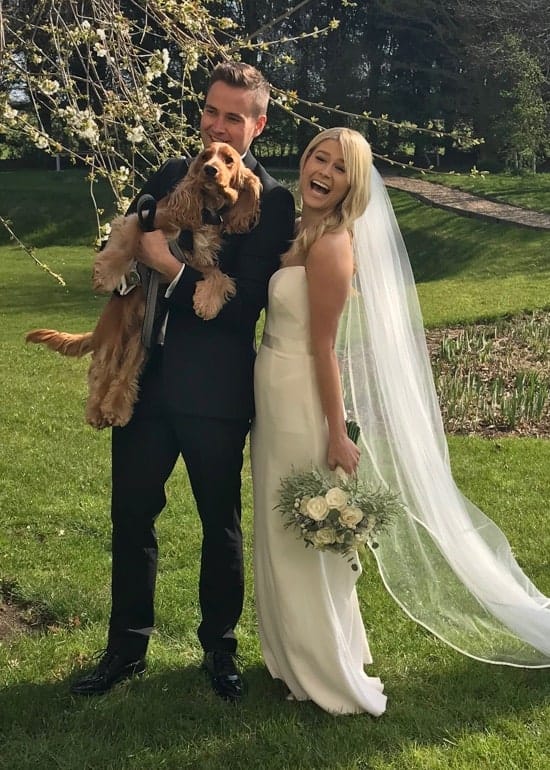 Bride and Groom with dog and flowers taken on iPhone 7