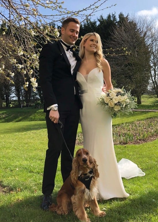 Bride and Groom with dog and flowers taken on iPhone 8