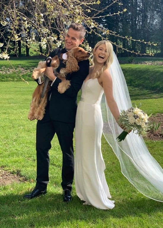Bride and Groom with dog and flowers taken on iPhone XS