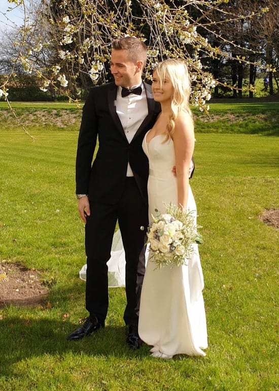 Bride and Groom with flowers taken on Samsung S9+