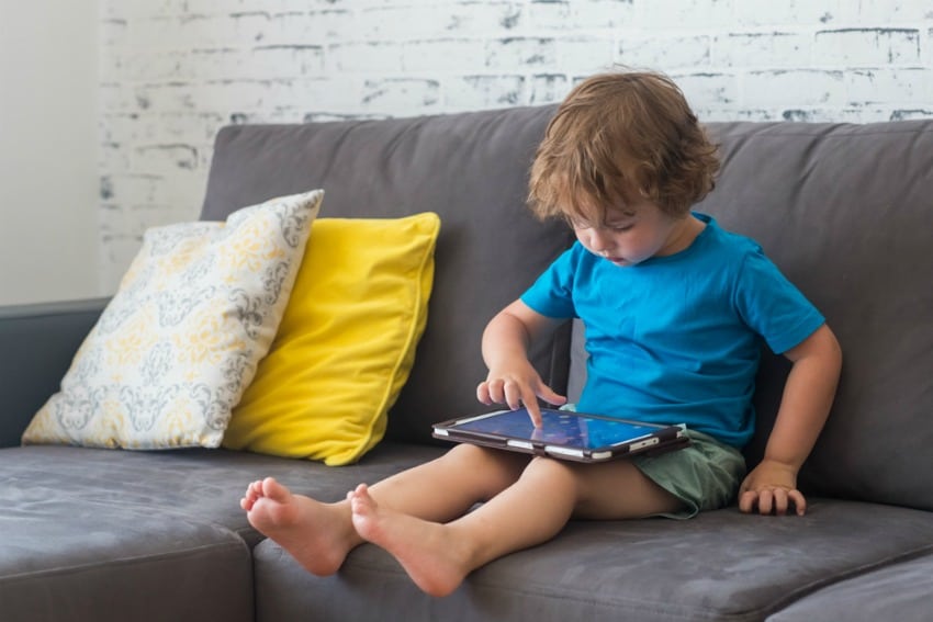 Image of boy looking at screen