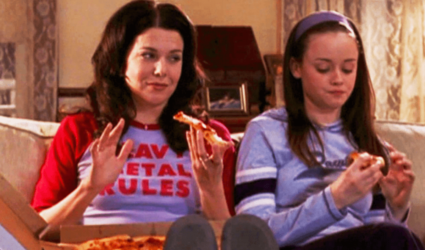 Image of the Gilmore girls poor spending habits eating pizza takeaway
