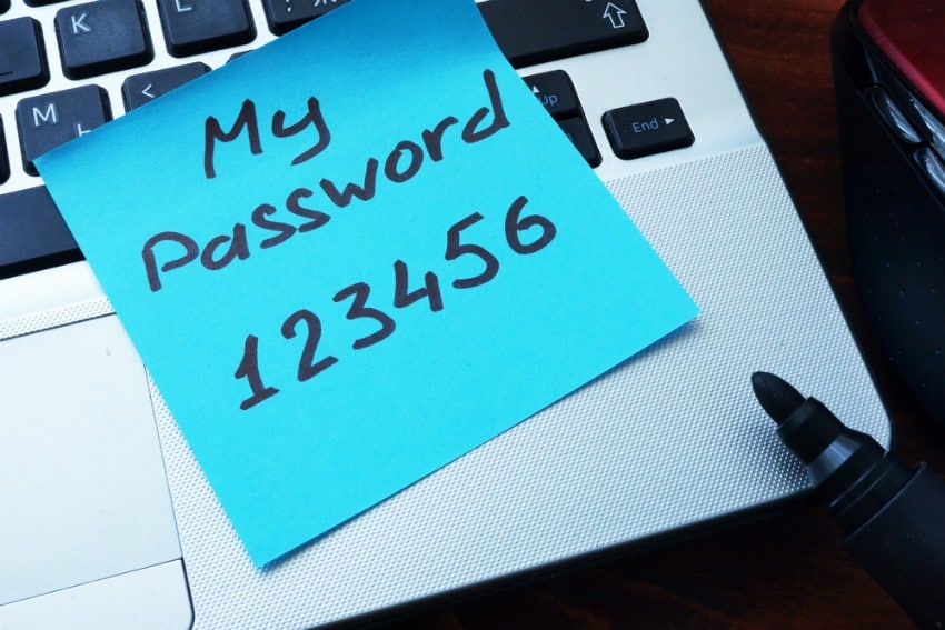 Image of note for passwords on laptop