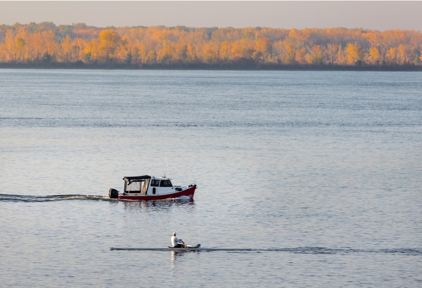 Image of man having commute for free by rowing