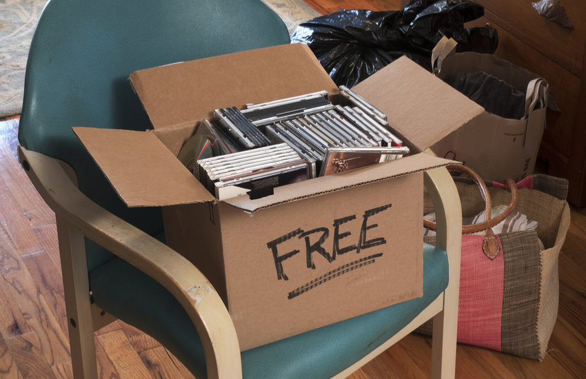 Box of DVDs and CDs