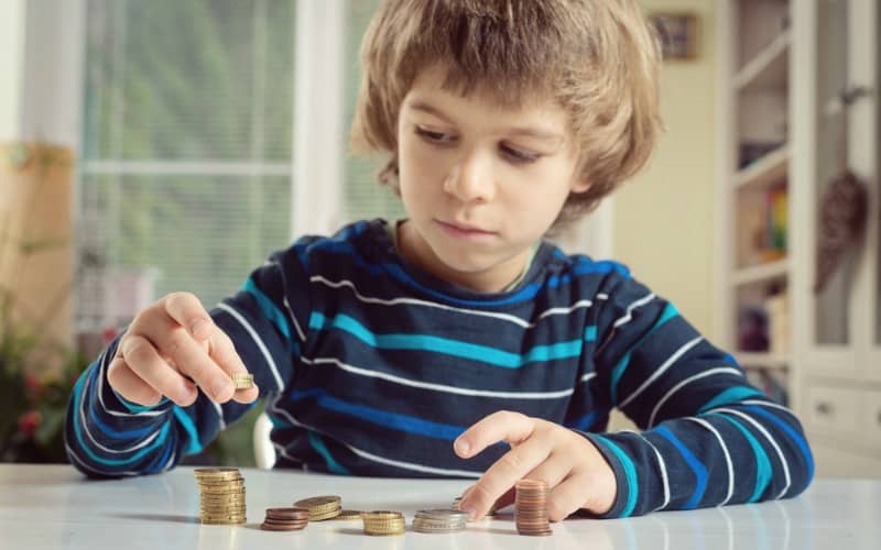 Boy counting coins