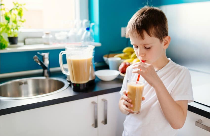 Boy drinking smoothie