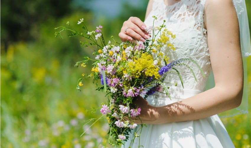 Bride with wildflower bouquet