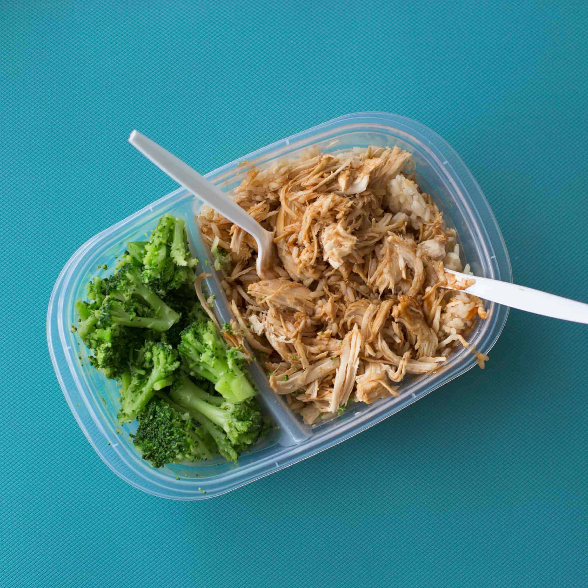 broccoli and chicken meal prep with cutlery