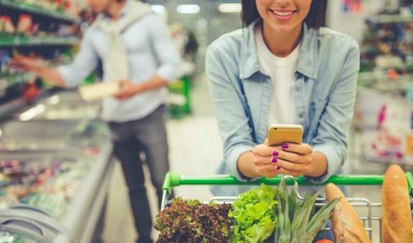 Girl shopping in supermarket