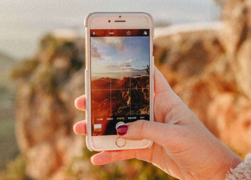 Image of woman taking professional photos