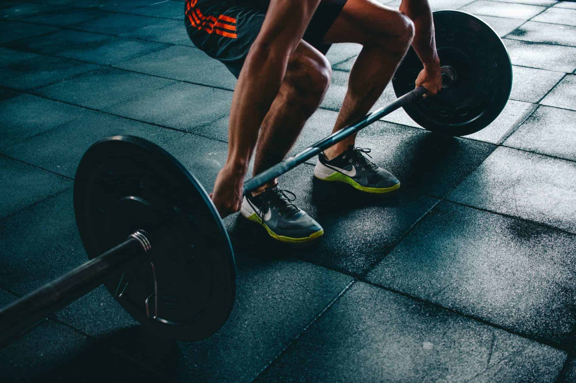 deadlifting bar in the gym