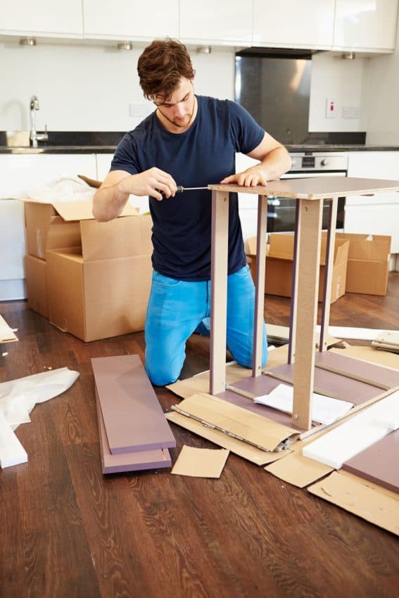 Man assembling furniture