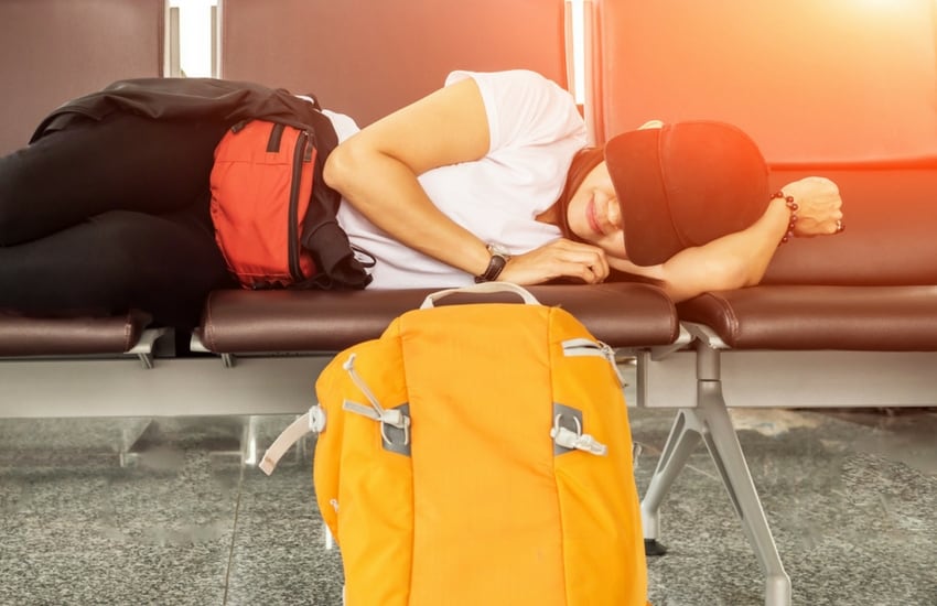 Woman sleeping in airport