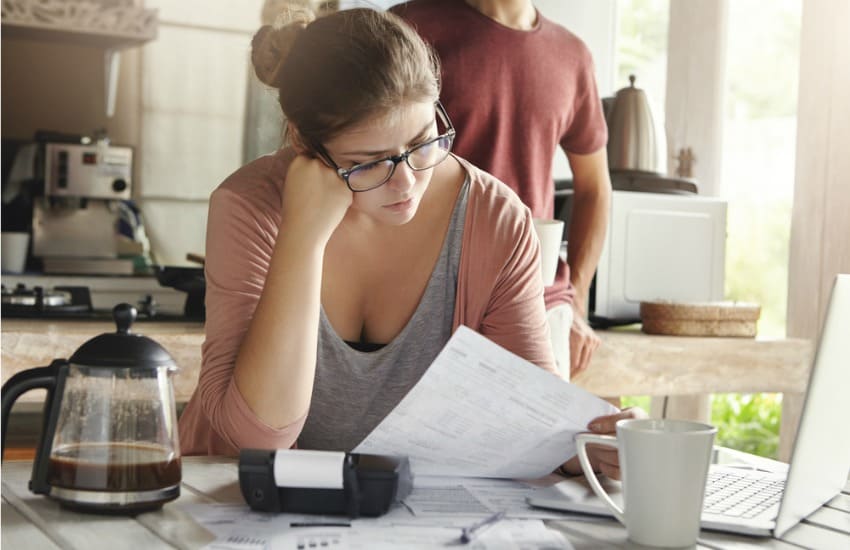 Woman worrying about debts